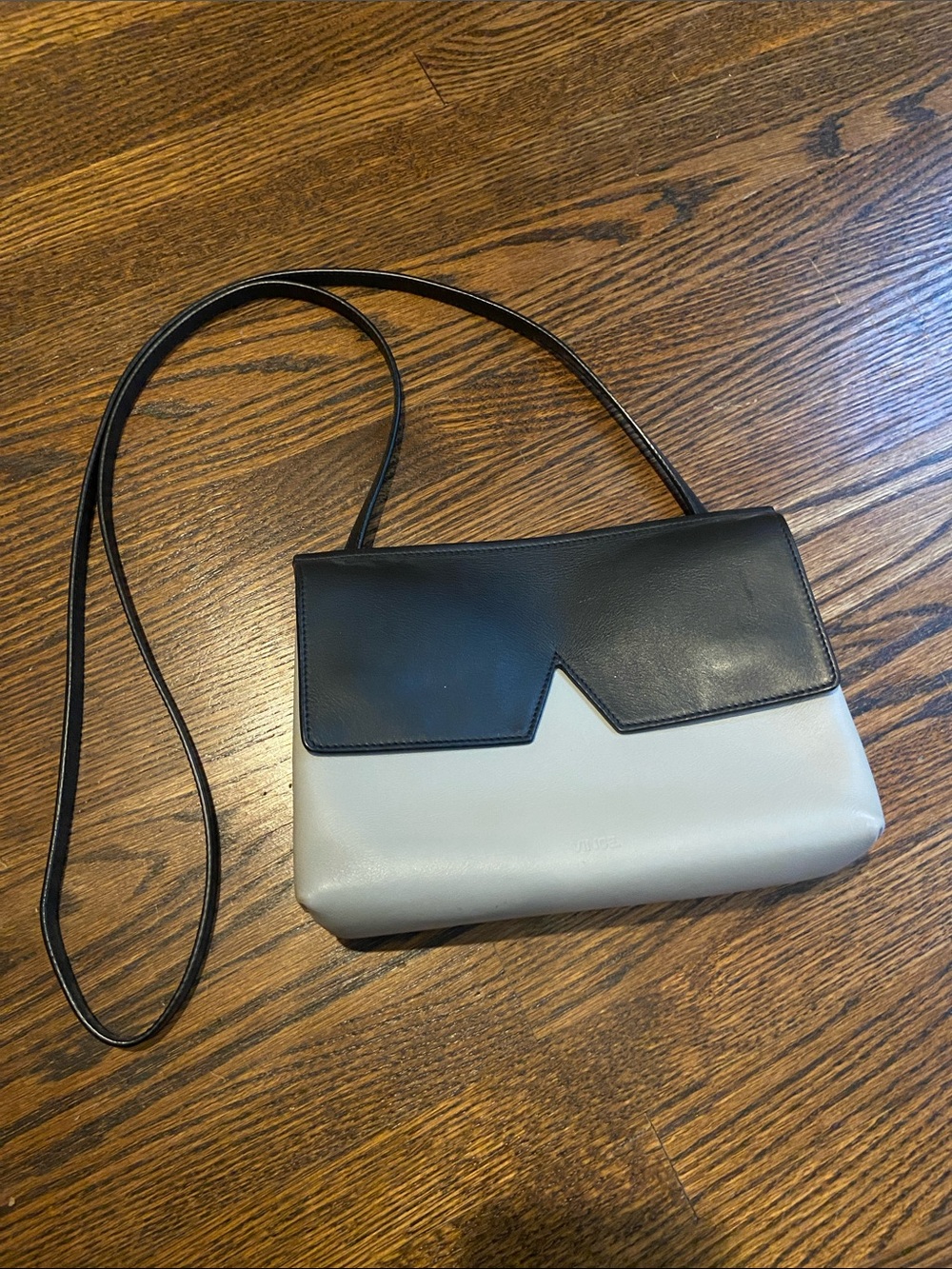 Vince. Signature V clutch/cross body bag